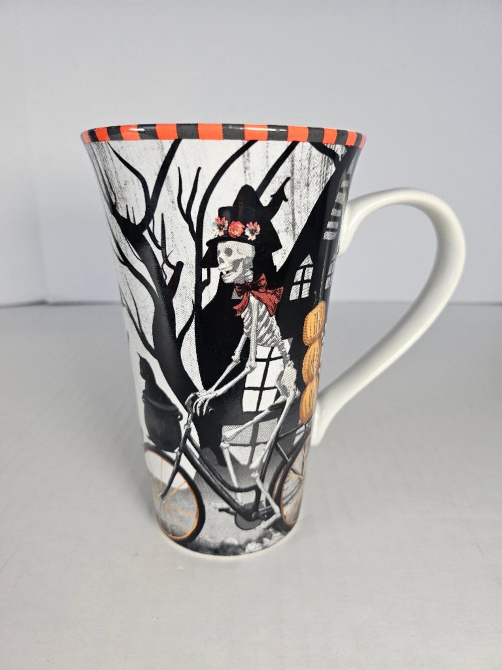 222 Fifth Halloween Bicycle Skeleton Porcelain Tall Latte Coffee Mug Cup 16 oz.